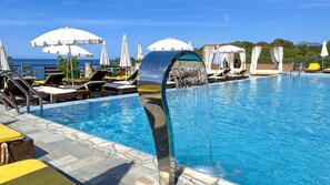 Seasonal outdoor pool, open 9:00 AM to 9:00 PM, free pool cabanas