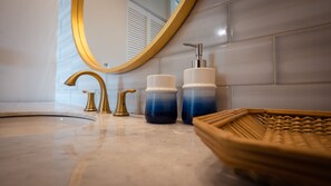Combined shower/bathtub, hair dryer, towels, soap