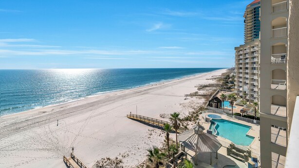 A beachfront hotel with a pool, beach access, and ocean views. - Fourwinds 803-Cozy Beachfront condo-Hall Bunks-less crowded beaches-Epic Views (Orange Beach)