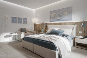 A modern bedroom with a large bed, a bedside table, a nightstand, a small side table, and a wall-mounted lamp.