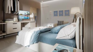 A modern bedroom with a bed, bedside table, TV, and a wardrobe.