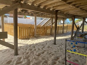 Relax in a tranquil beachside haven with a playground for kids nearby.