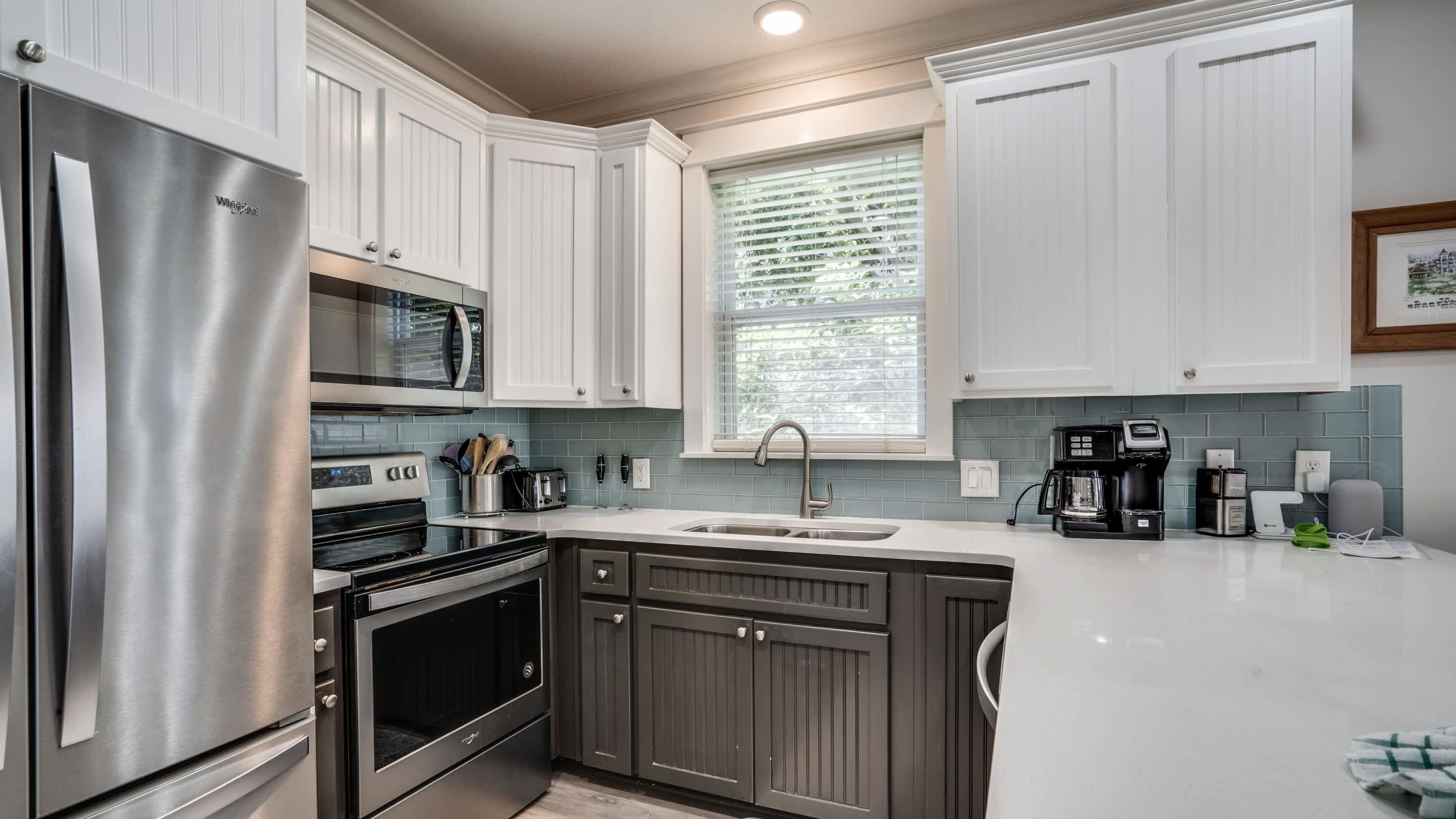 Coffee/tea maker, fridge, microwave, oven