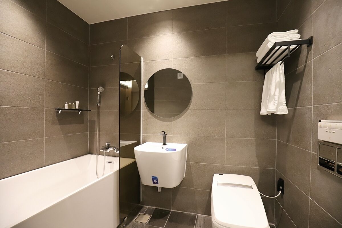 superior double room | bathroom | hair dryer, bathrobes, slippers, bidet