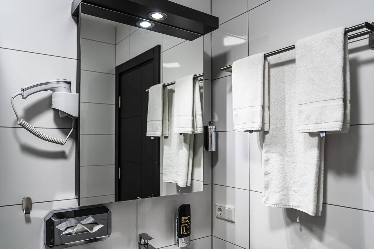 shower, hair dryer, heated floors, towels