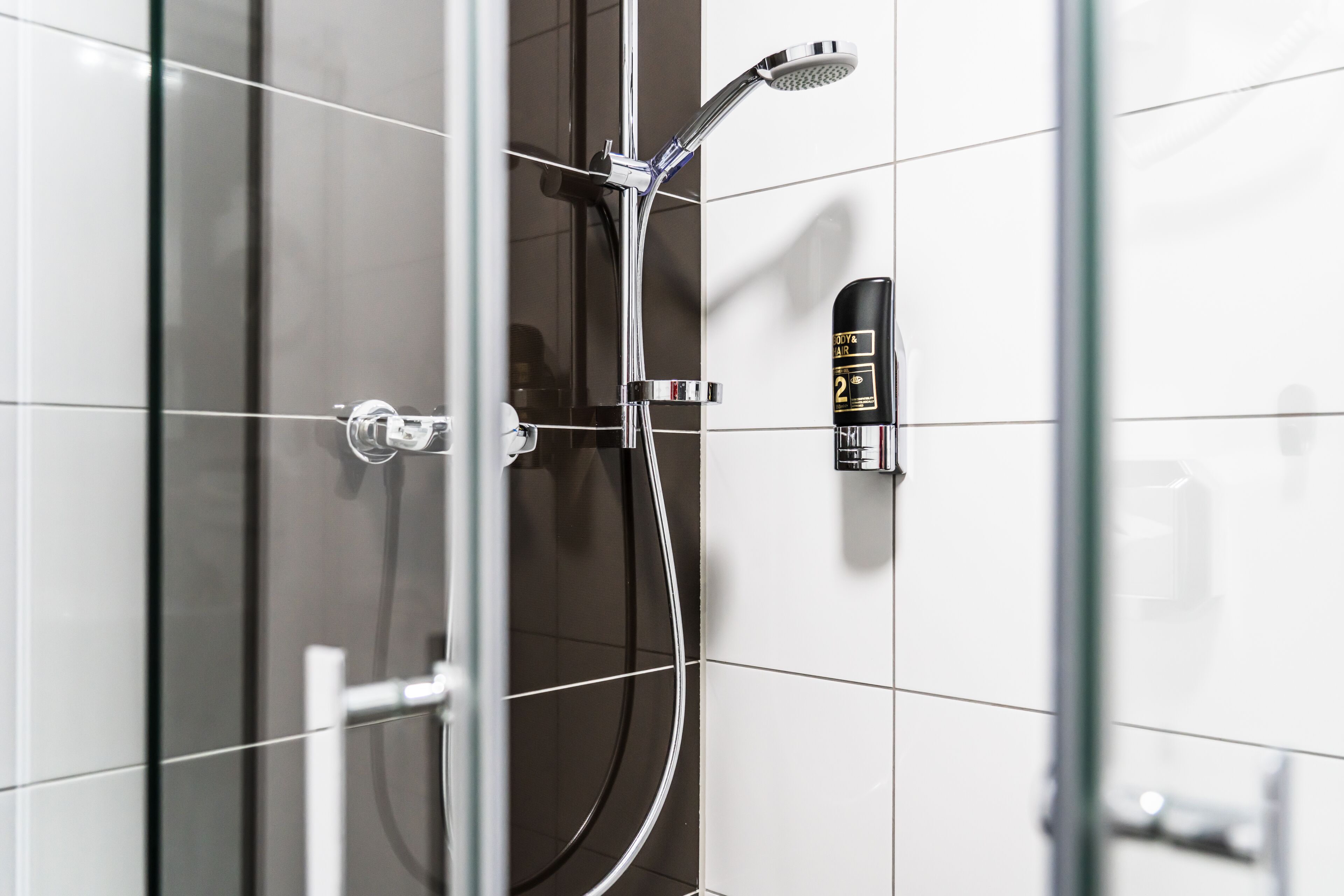 shower, hair dryer, heated floors, towels