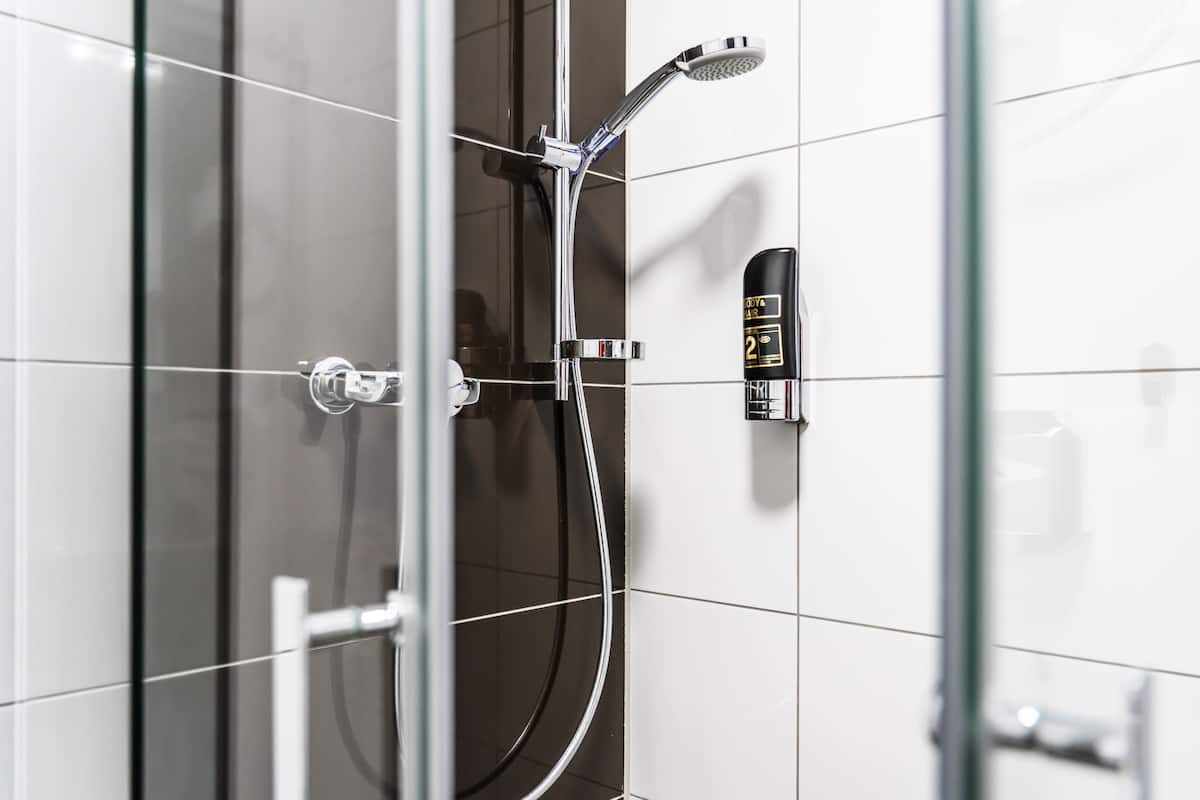 shower, hair dryer, heated floors, towels