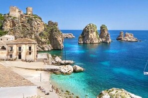 On the beach, sun loungers, beach towels