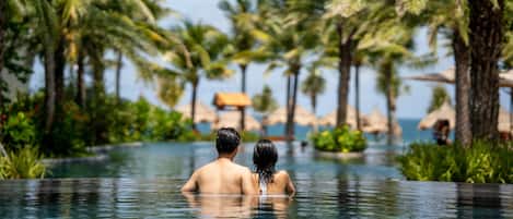 2 outdoor pools, pool umbrellas, pool loungers