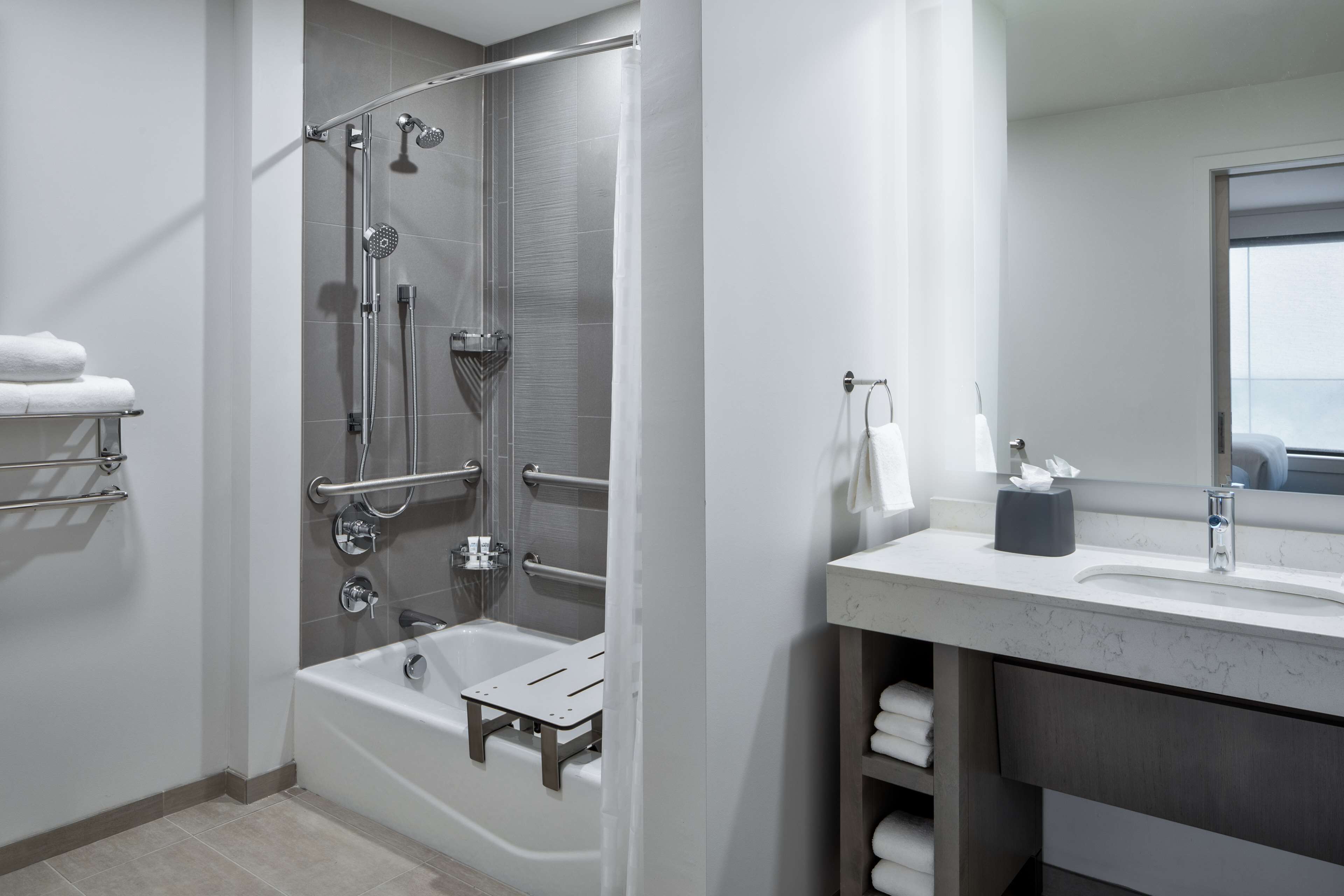 rainfall showerhead, hair dryer, towels