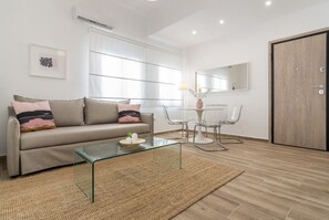 Apartamento | Área de estar | TV de tela plana 40 polegadas com canais digitais, TV