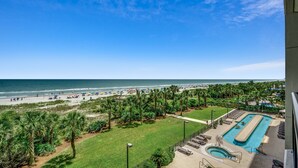 A resort with a pool, beach, and ocean view. - 🌞🌊Lazy River + Indoor/Outdoor Pools | Oceanfront | South Wind 402 (Myrtle Beach)