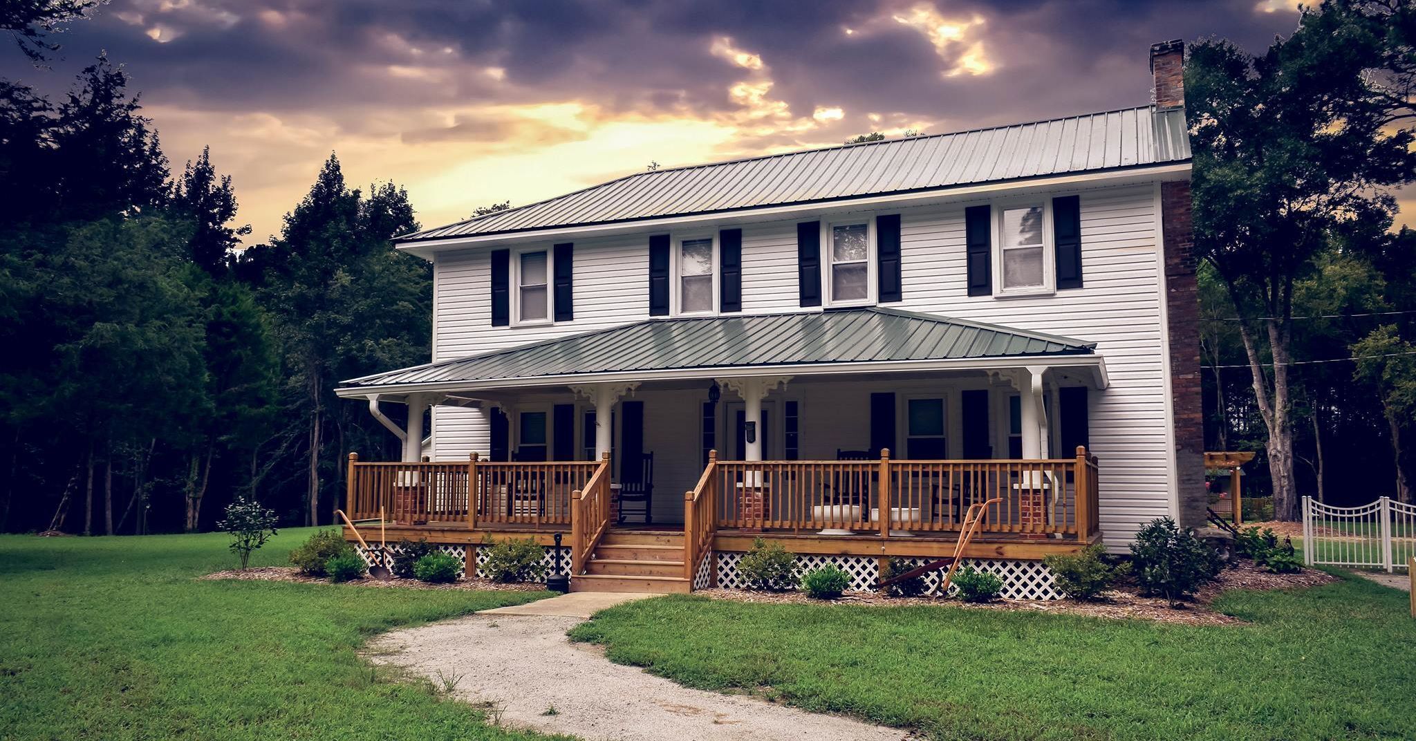 Historical 4 bedroom farmhouse located creek-side on 3 acres of beautiful nature