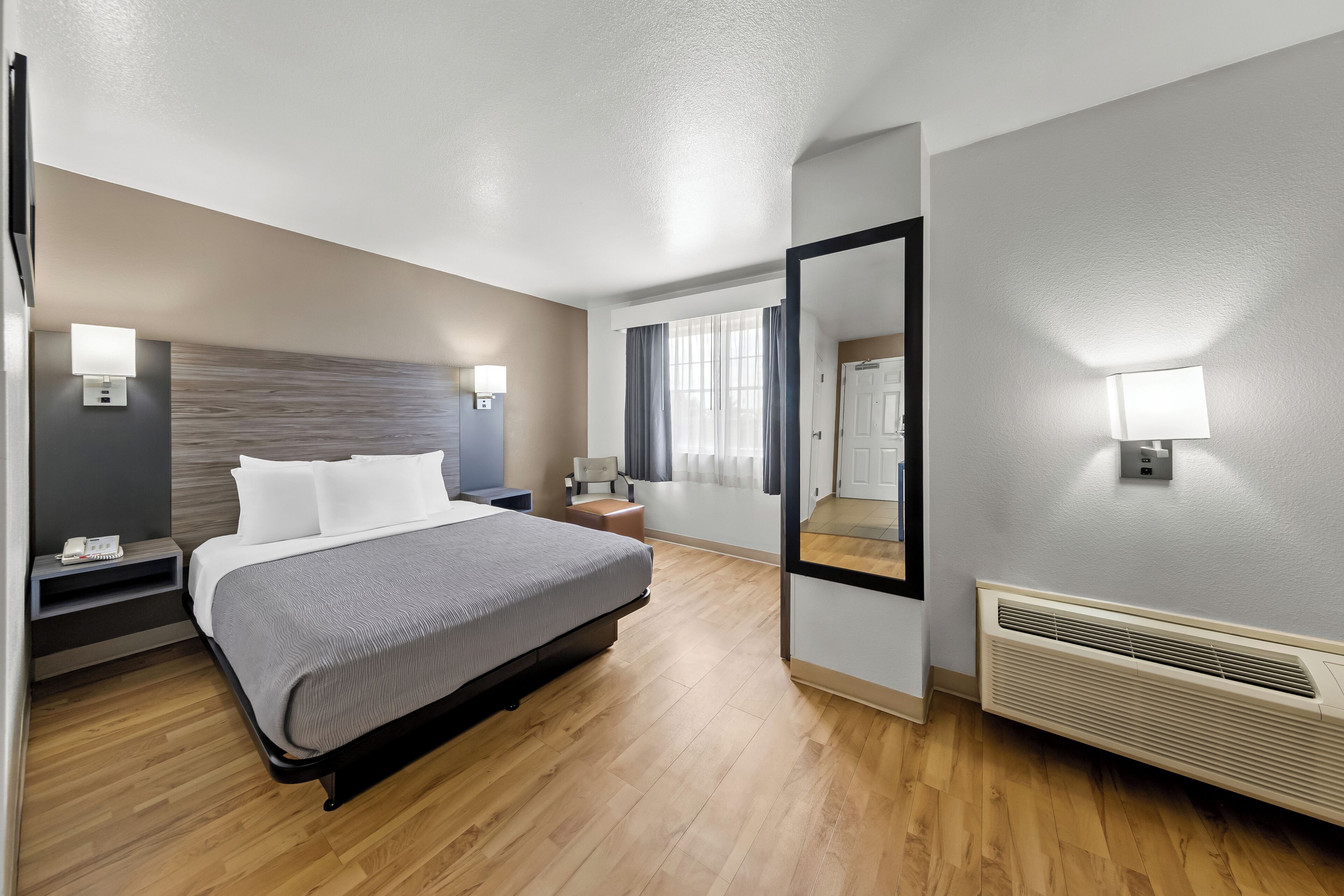 Premium bedding, desk, laptop workspace, free WiFi