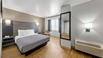 Premium bedding, desk, laptop workspace, free WiFi