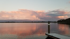 Enjoy serene lakeside views from a simple dock.
