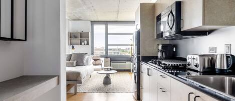 Fridge, microwave, stovetop, coffee/tea maker