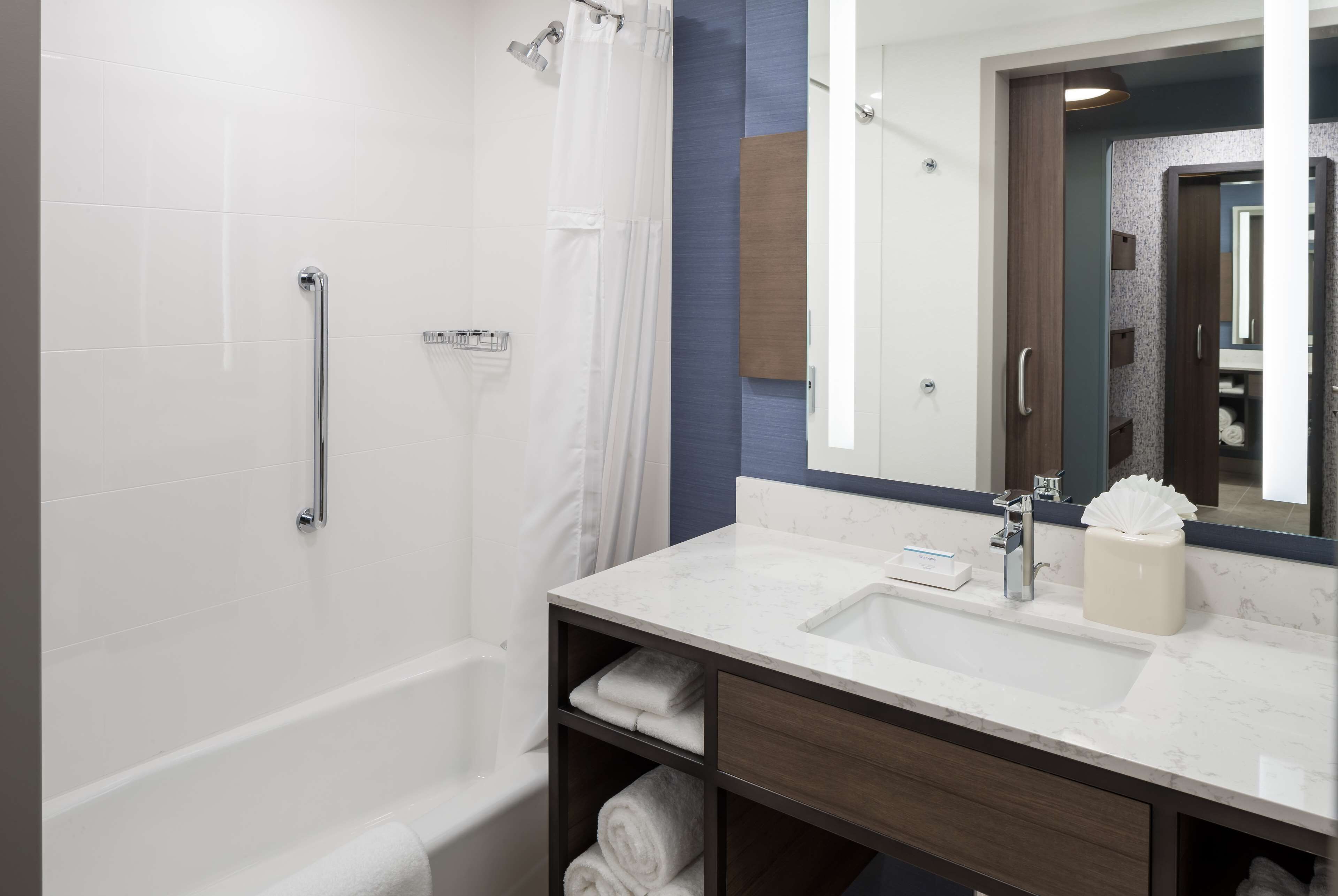 hair dryer, towels, soap, shampoo