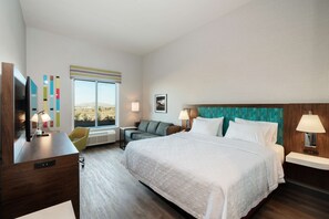 En 55-tommers Flatskjerm-TV med kabel-kanaler samt TV og filmkjøp