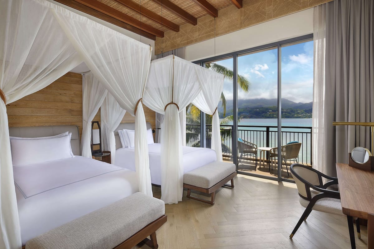 Premium bedding, free minibar items, in-room safe, desk