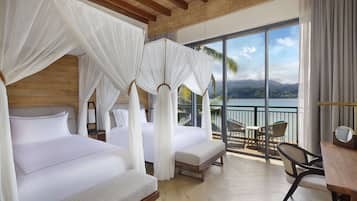 Premium bedding, free minibar items, in-room safe, desk