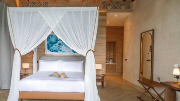 A bedroom with a four-poster bed, a bedside table with a lamp, a wooden bench, and a large mirror.