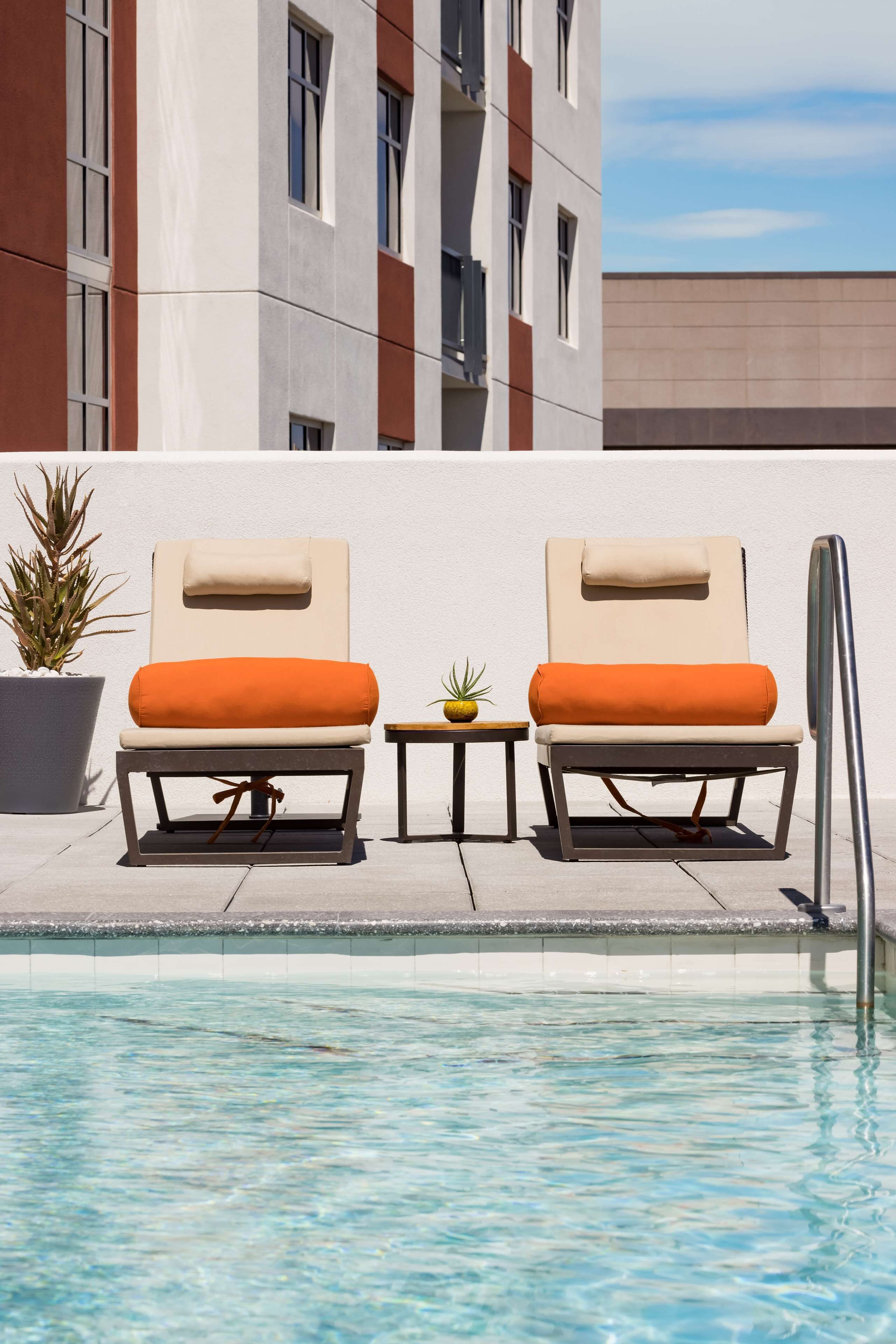 outdoor pool, pool loungers