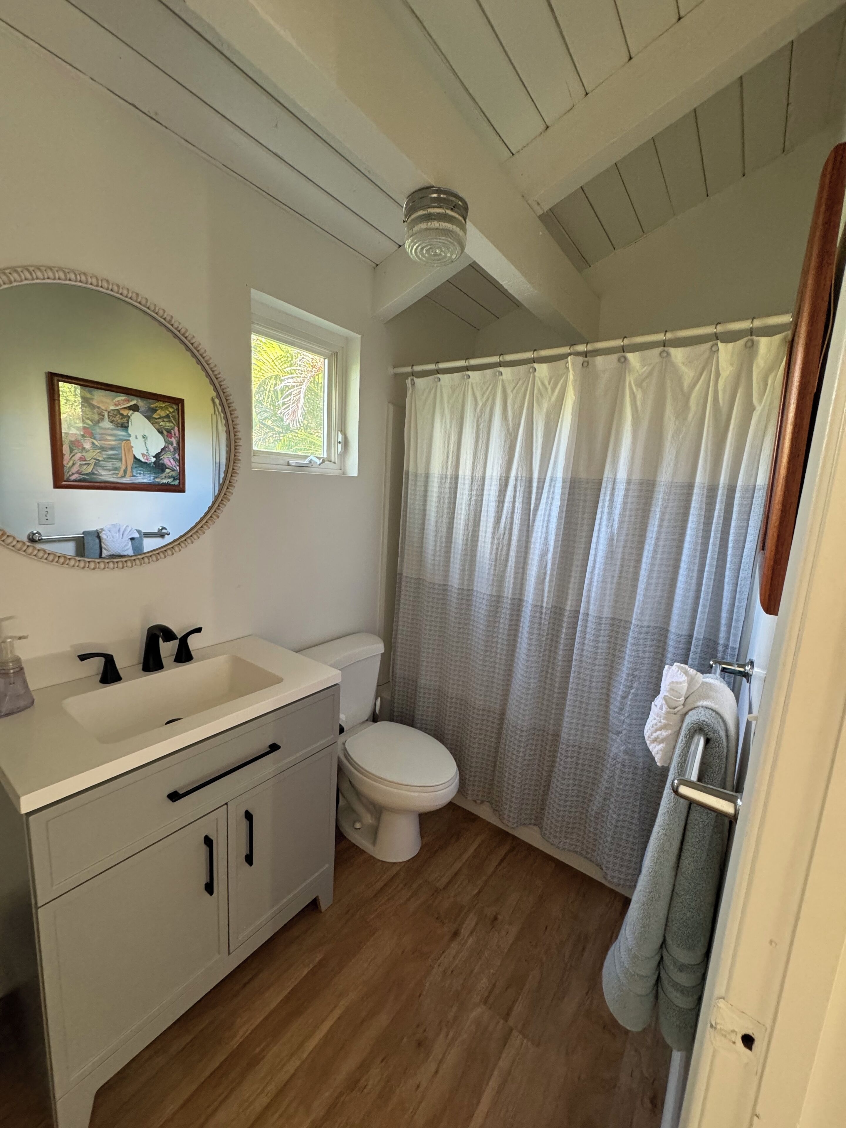 Combined shower/tub, hair dryer, towels, soap