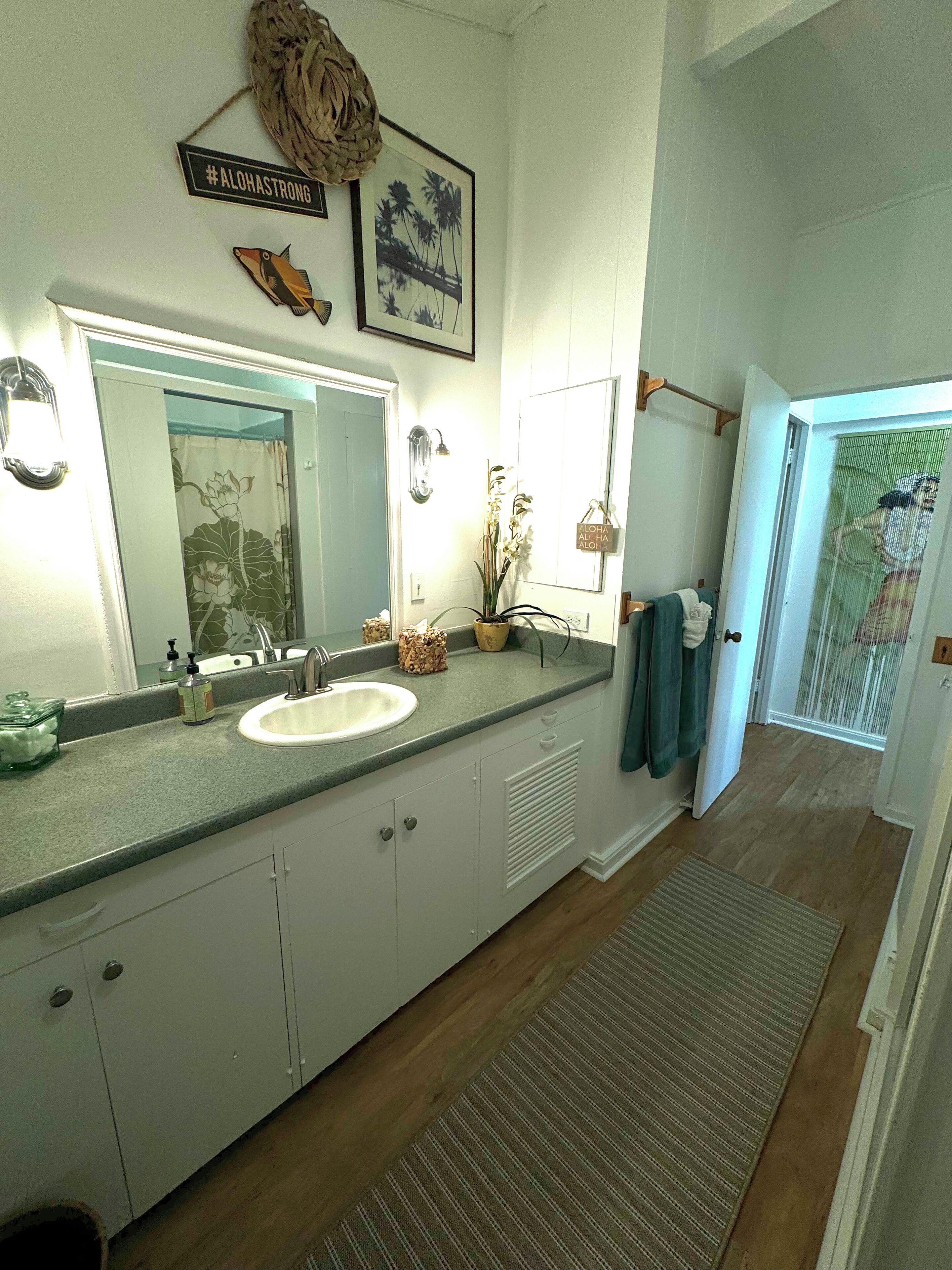 Combined shower/tub, hair dryer, towels, soap