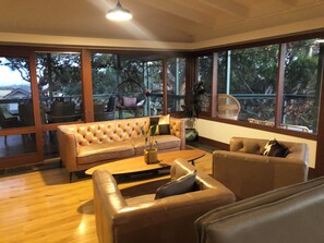 Smart TV, fireplace, table football, books