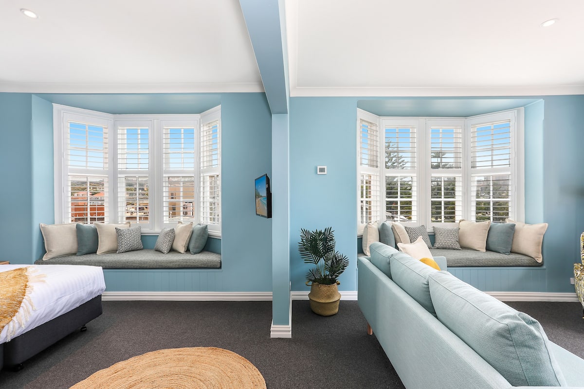 bay suite, 1 king bed | living area | 50-inch smart tv with digital channels, tv