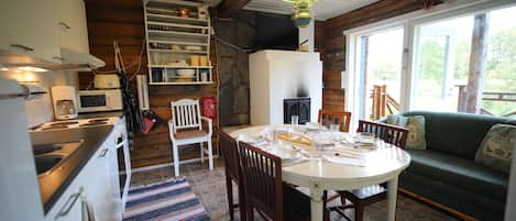 Cabin | Private kitchen | Fridge, microwave, oven, stovetop
