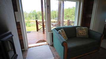 Cabin | Living area | TV, fireplace
