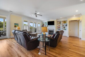 TV, books - Large Home Right by the Beach! Private Pool & Elevator! Fun Backyard w/ Swingset (Isle Of Palms)