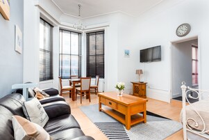 Apartment | Living area | 24-inch flat-screen TV with digital channels, TV