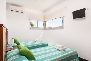 4 bedrooms, desk, iron/ironing board, travel cot
