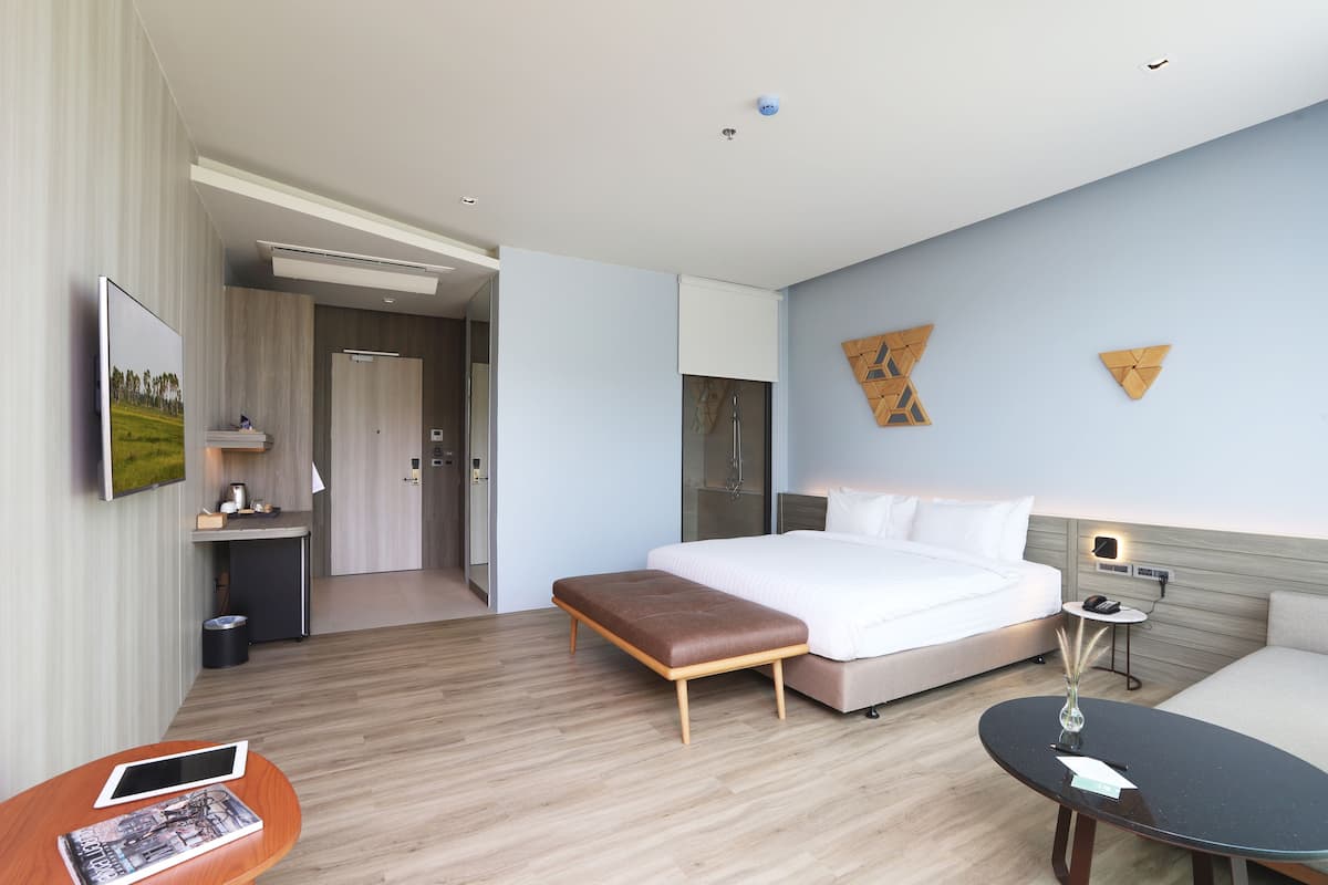 Deluxe-Zimmer | Minibar, individuell dekoriert, individuell eingerichtet