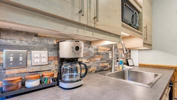 Fridge, microwave, coffee/tea maker, toaster