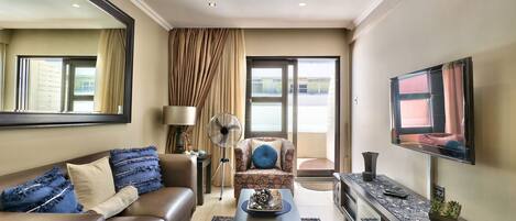 Basic Double Room | Living area | TV