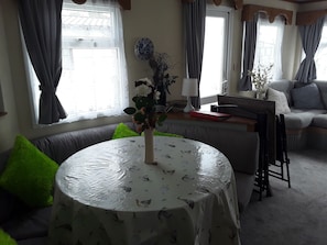 House, Multiple Beds | Living room | 30-inch TV with digital channels, fireplace