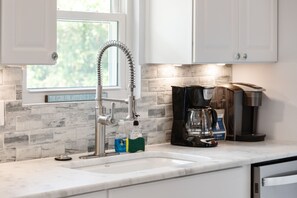 Fridge, microwave, oven, stovetop - 1018 East Cooper! Cozy Cottage! Close to Beach access, Cornhole, Large Deck. Pet ok w/fee (Folly Beach)