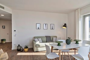 Grand Apartment | Living area | 32-inch flat-screen TV with digital channels, TV - Deluxe Apartments by Wonderful Italy (Genoa)