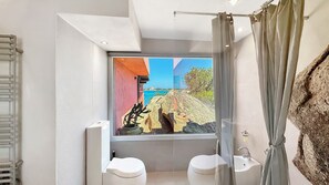 Apartment, 4 Bedrooms | Bathroom | Shower, rainfall showerhead, free toiletries, bidet