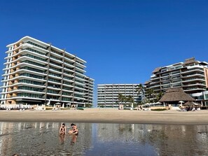 On the beach, sun-loungers, beach towels