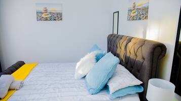 2 chambres, coffres-forts dans les chambres, fer et planche Ă repasser