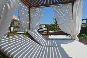 Outdoor pool, open 8:00 AM to 10:00 PM, pool umbrellas, sun loungers