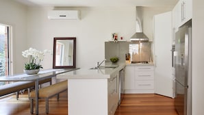 Superior House | Private kitchen | Fridge, stovetop, cookware/dishes/utensils - BOUTIQUE STAYS - Mordi Sands (Mordialloc)
