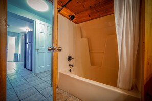Combined shower/tub, hair dryer, bathrobes, slippers