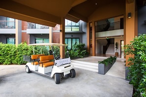Welcome to our hotel lobby, featuring a spacious open design with high ceilings and large windows.