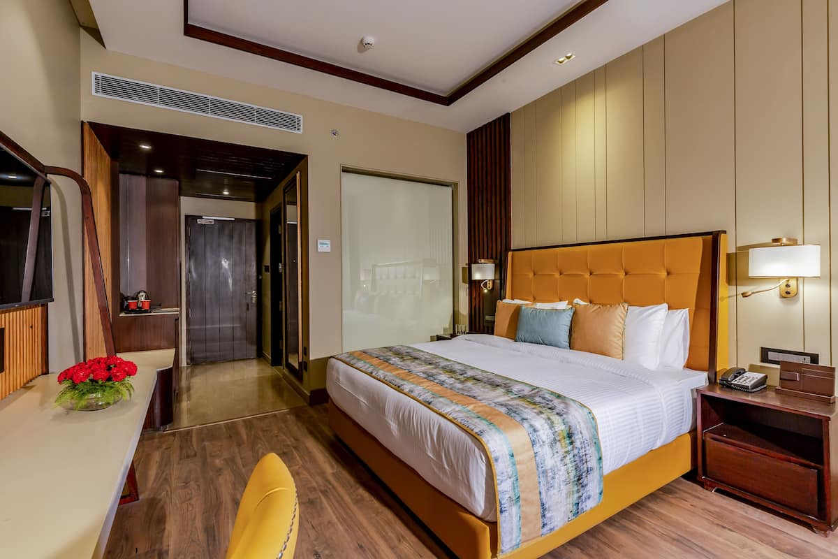 Camera Deluxe (Deluxe Room) | Biancheria da letto di alta qualità, minibar, una cassaforte in camera